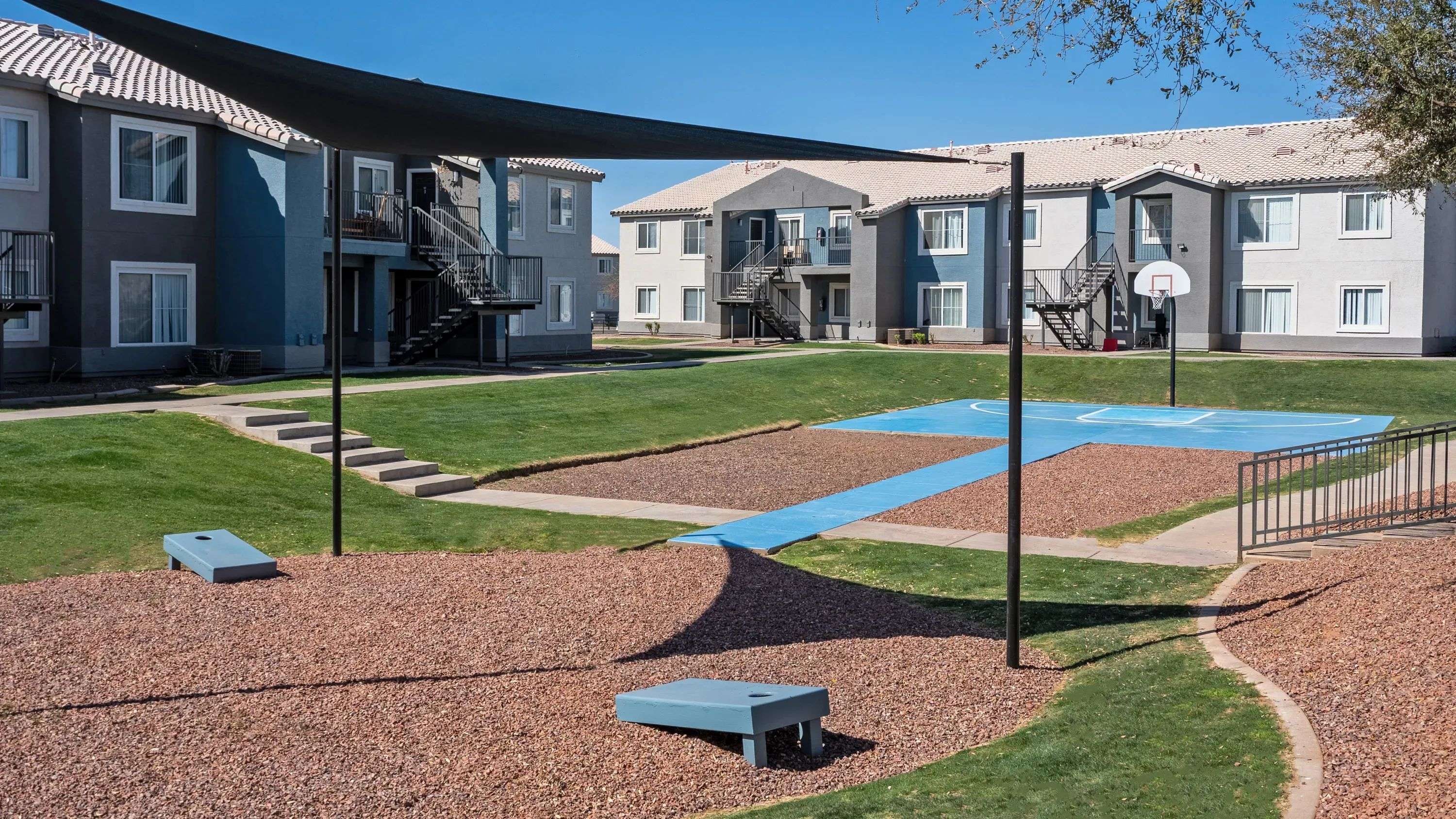 Hone your aim with a basketball hoop or perfect your aim in cornhole. 