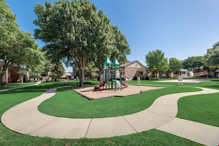 The Park at Wintergreen Apartments | DeSoto, TX | Playground and Jogging Path