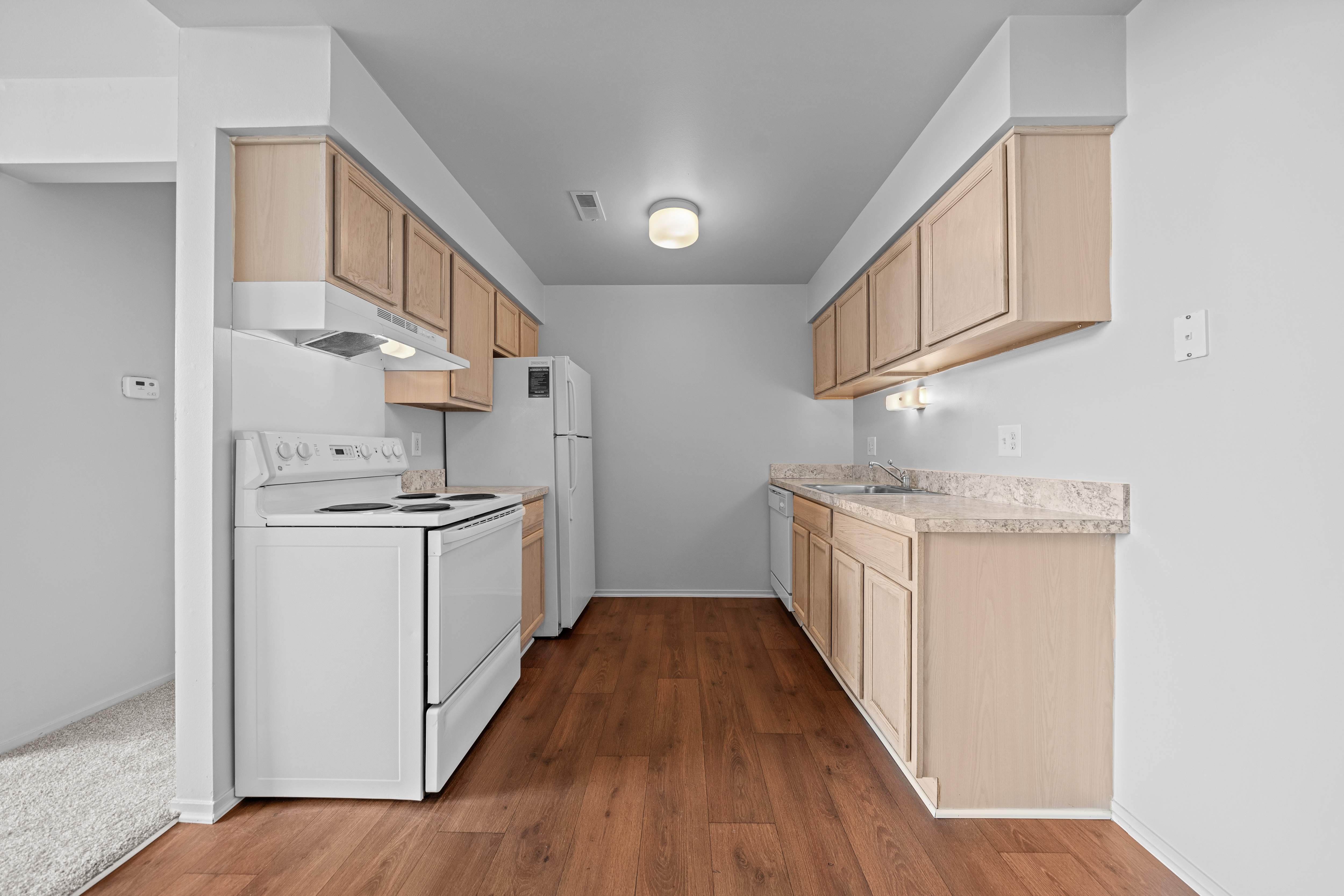 Large kitchen and dining room at Prentiss Pointe Apartments in Harrison Township, MI