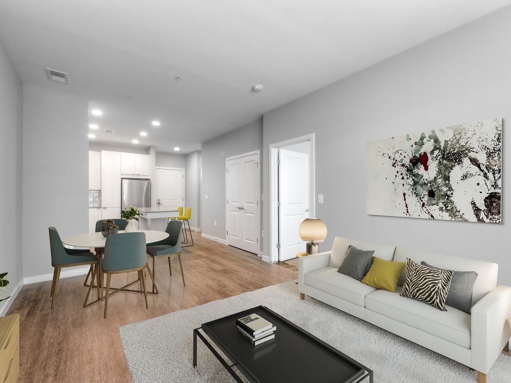 Kitchen, living, and dining areas with hard surface flooring