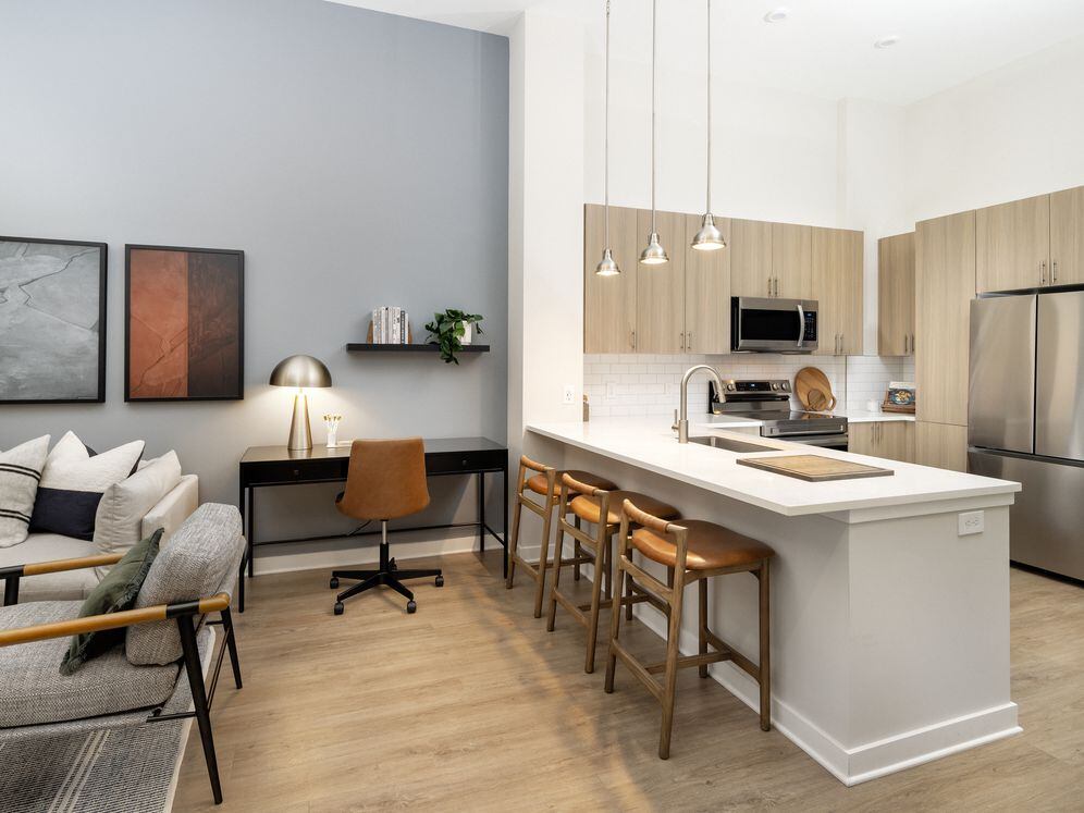 Kitchen and dining area with hard surface vinyl plank flooring