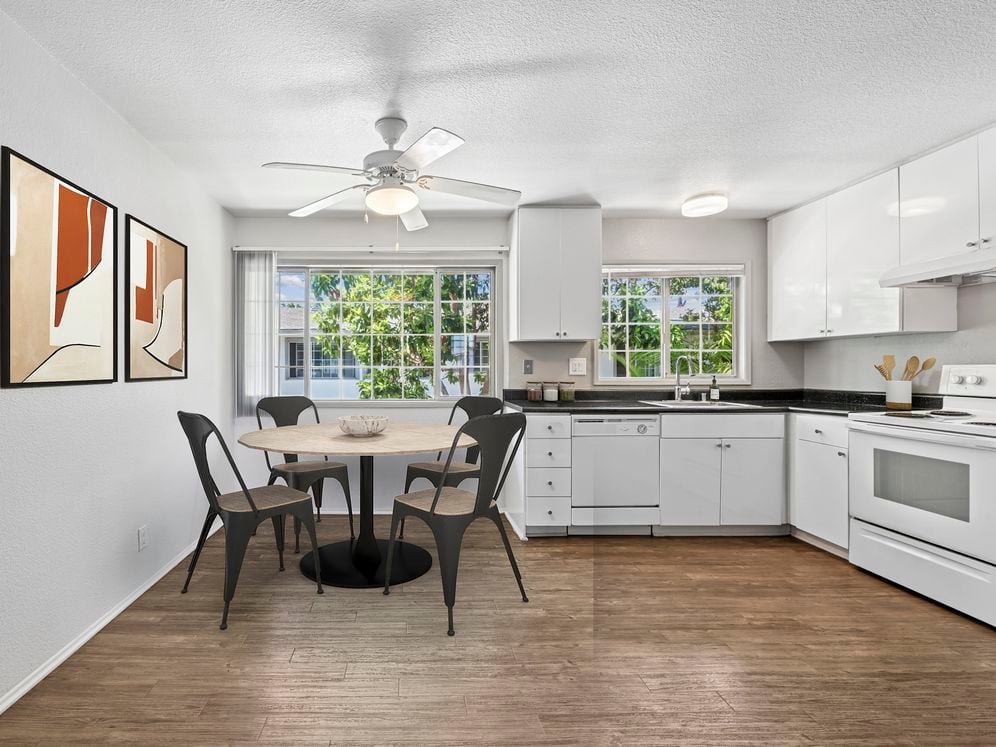 Kitchen and dining area with hard surface flooring