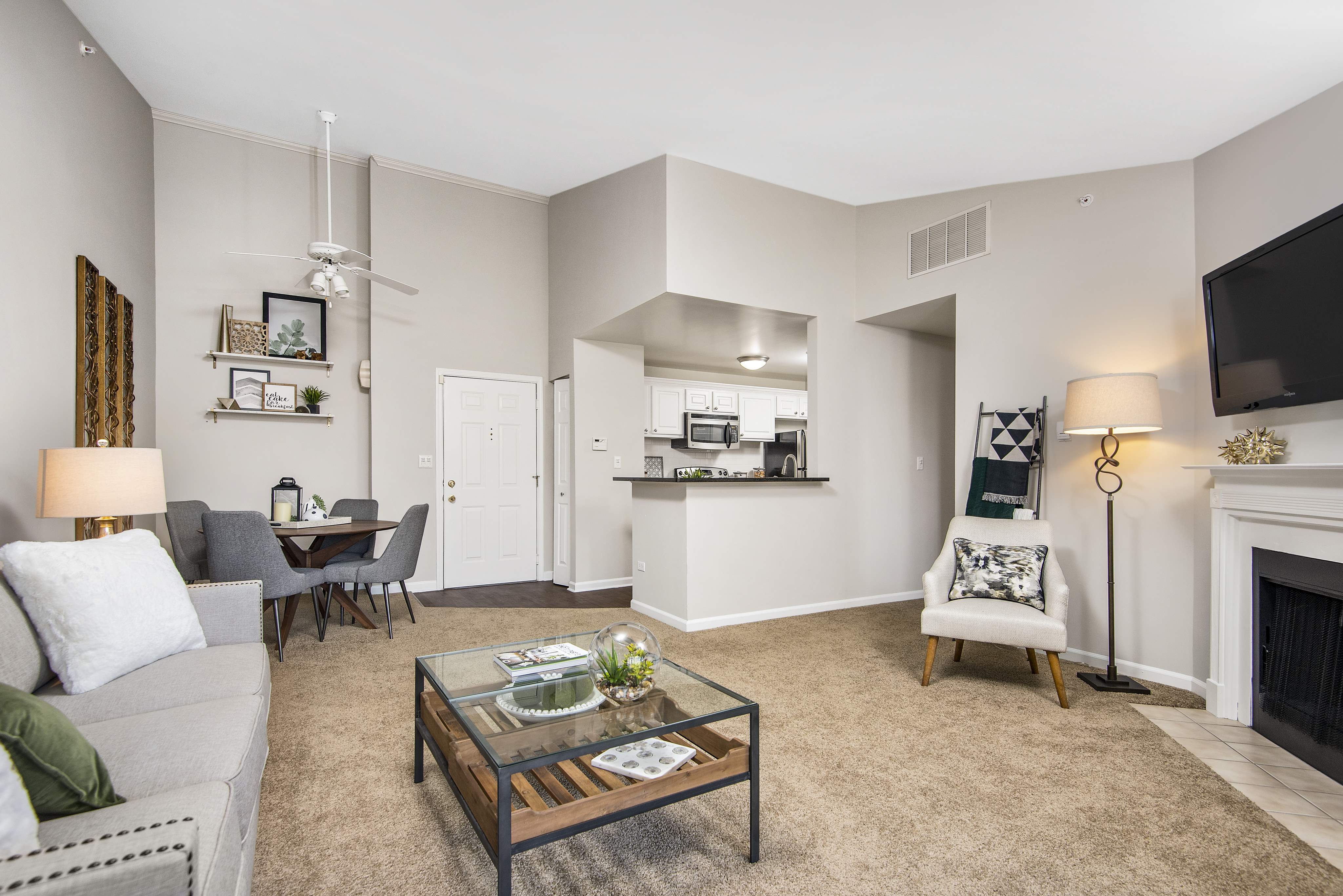 Open Layouts with plank floorin in kitchens, bath, and foyer