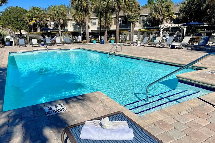 Relax on our expansive sundeck on one of our many poolside loungers.