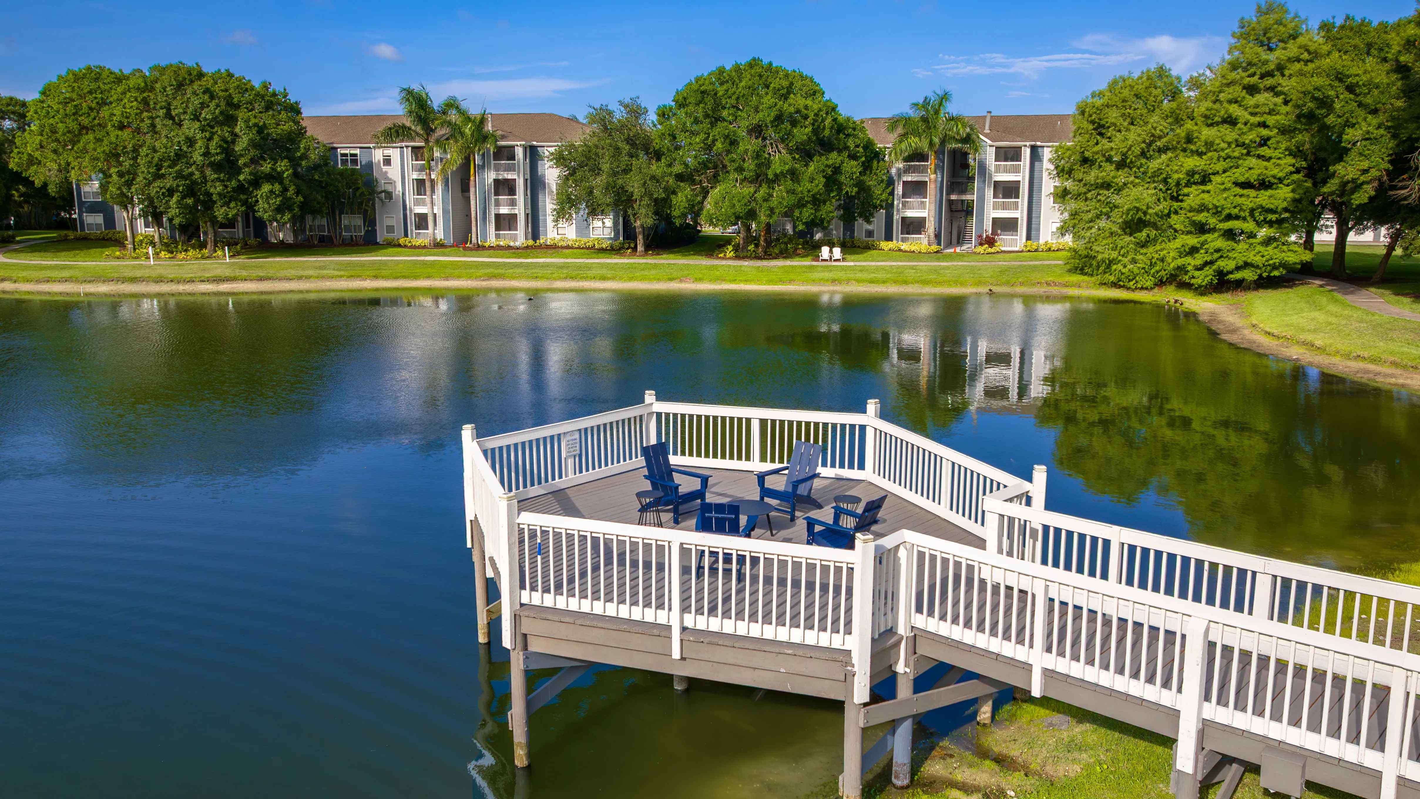 Enjoy the beauty of nature right outside your door with our lakeside seating area, offering a perfect spot to relax, gather, and recharge.