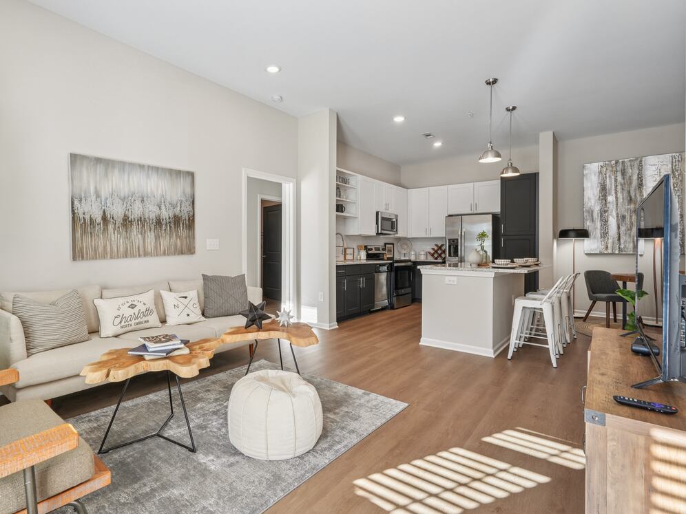 Kitchen and living room with hard surface flooring