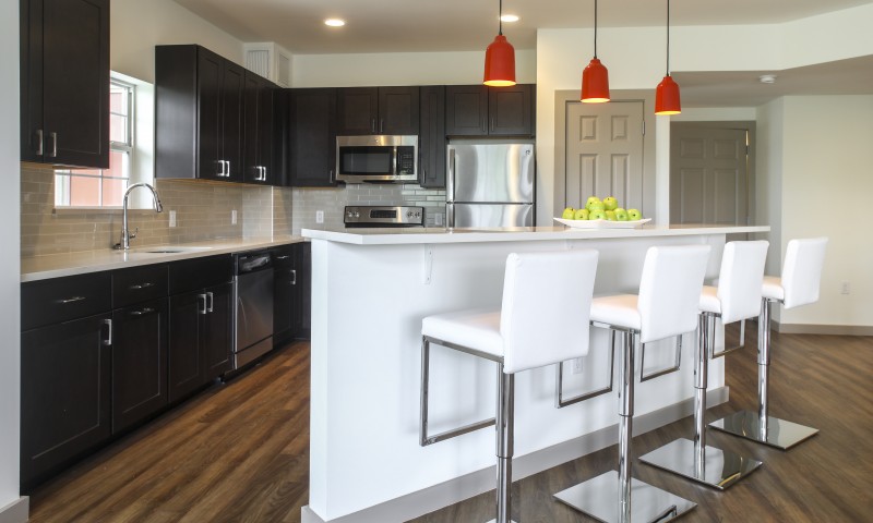 Large kitchens with stainless steel appliances