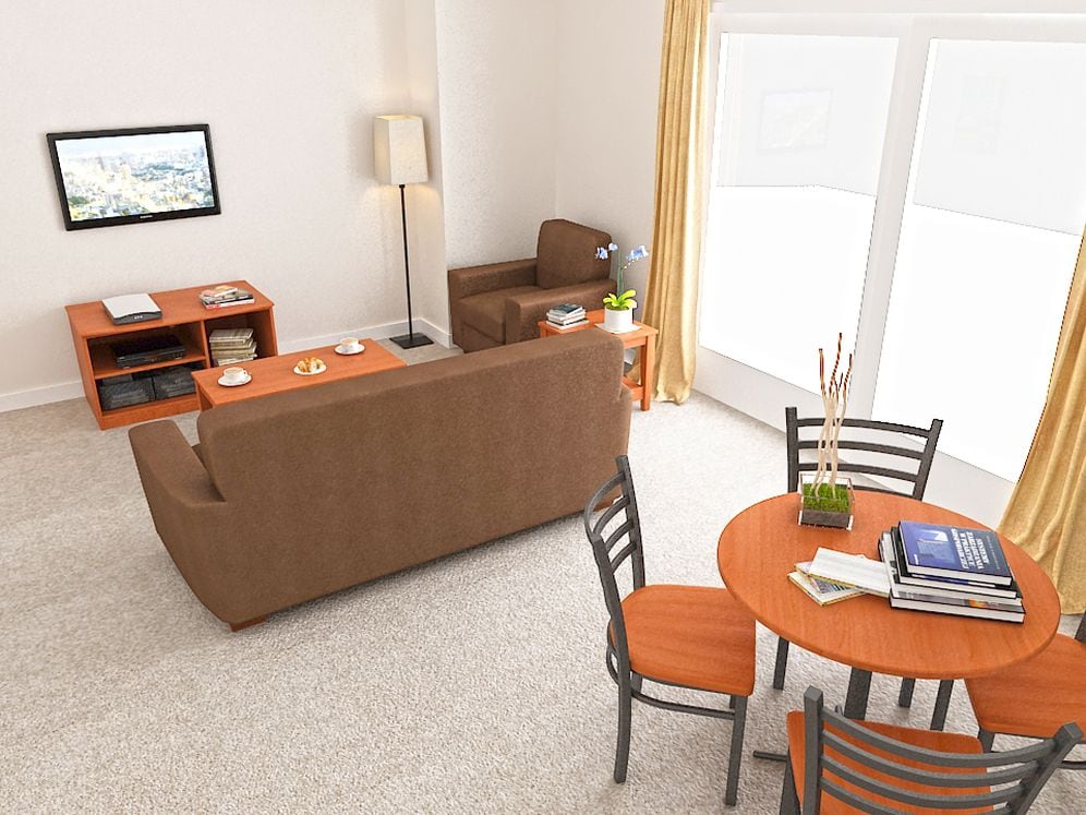 Living and dining area with carpeted flooring