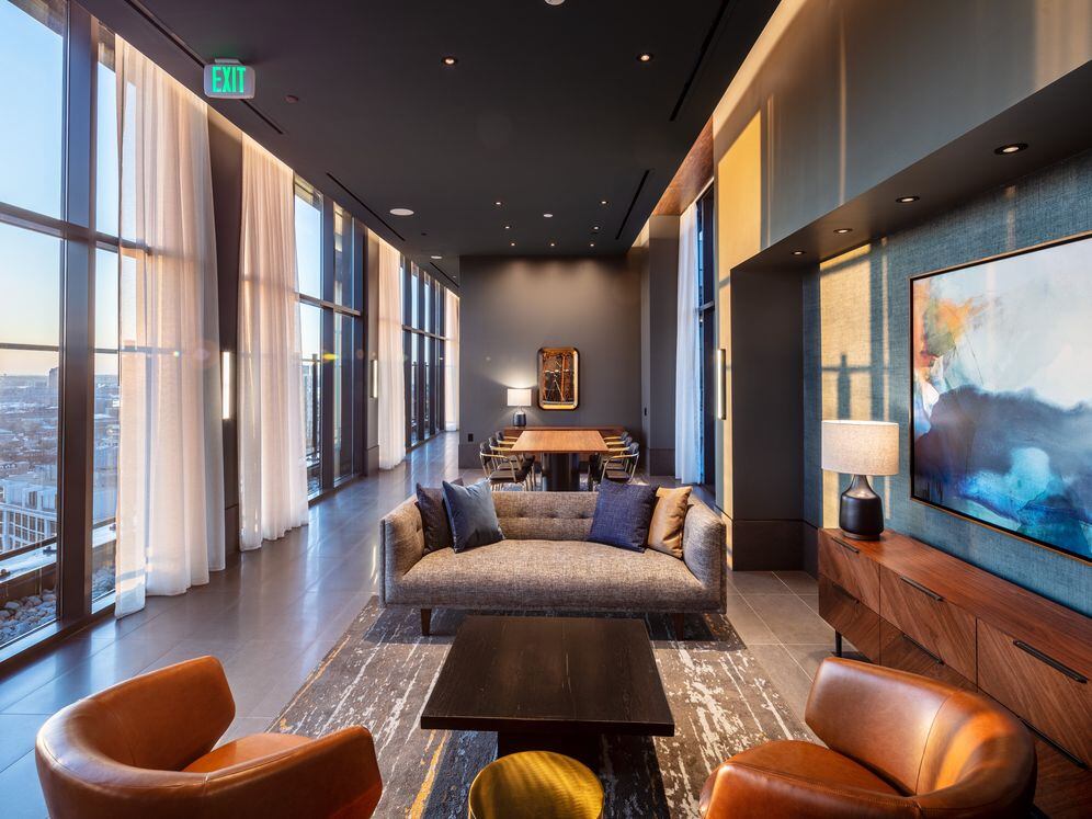 24th floor indoor lounge with multiple seating areas and co-work space