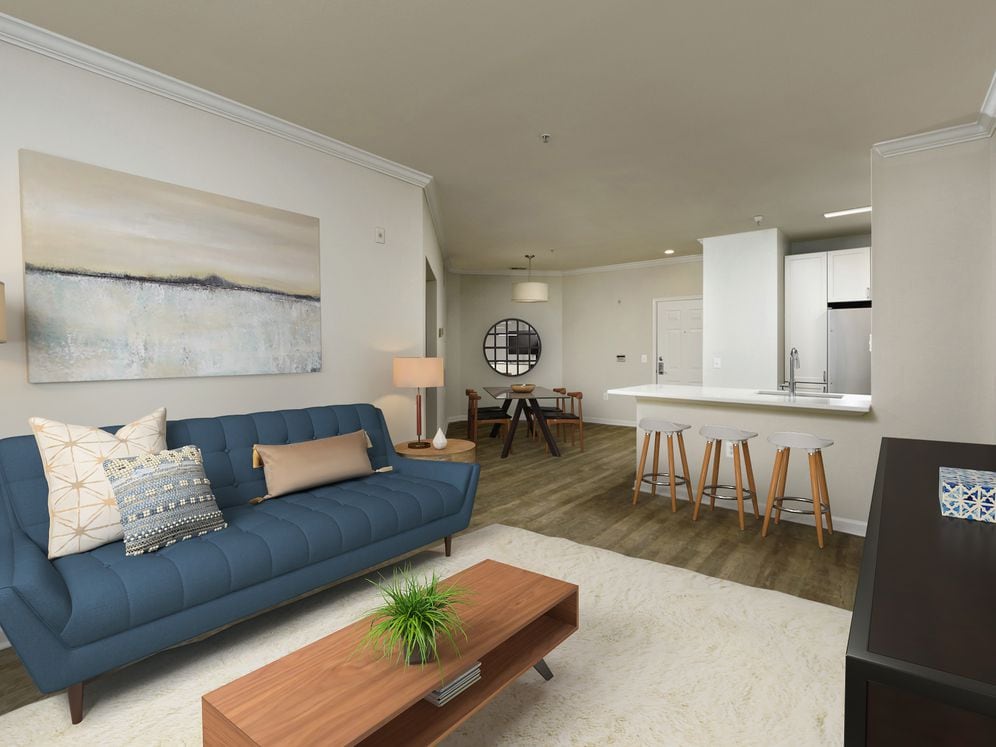Renovated II kitchen, living, and dining areas with hard surface flooring