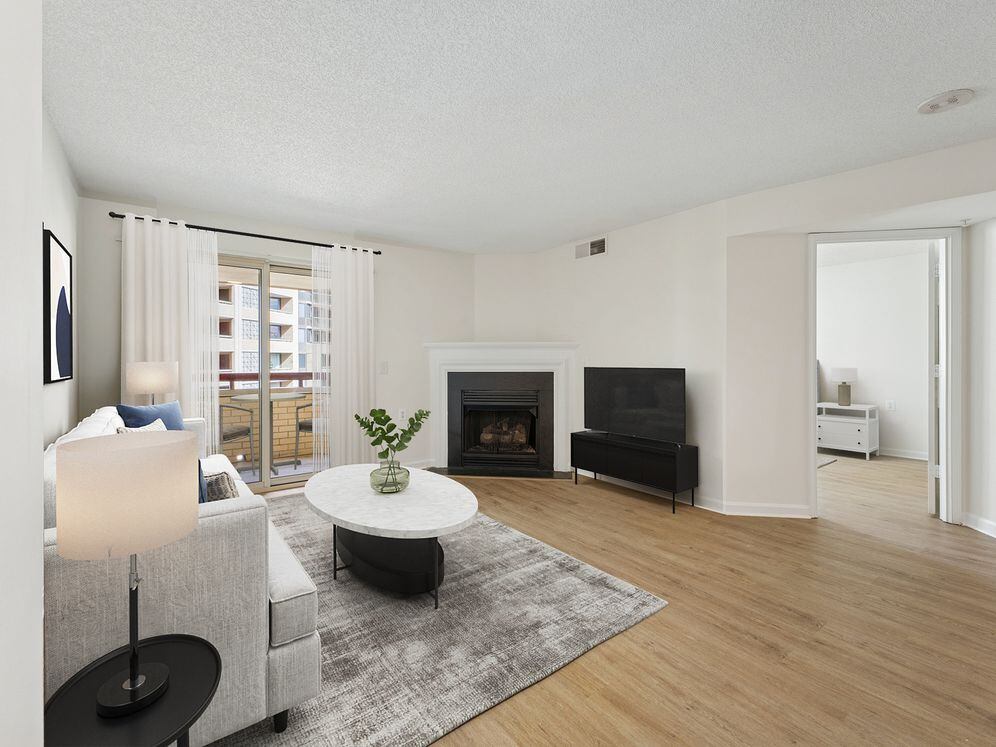 Renovated Package II living room with hard surface flooring