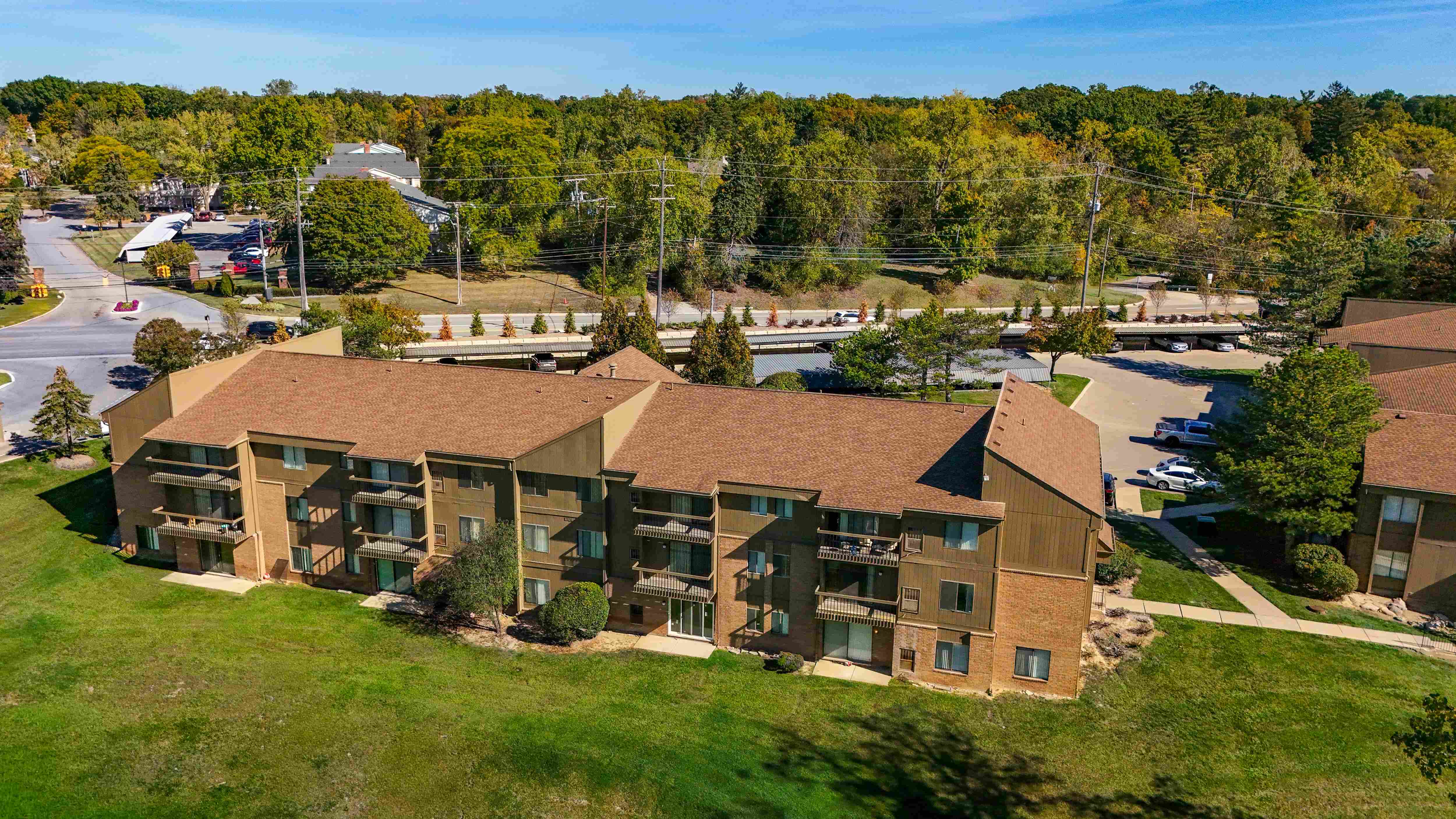 Expansive Green Space Apartment Building Exterior at Franklin River Apartments, Southfield, MI