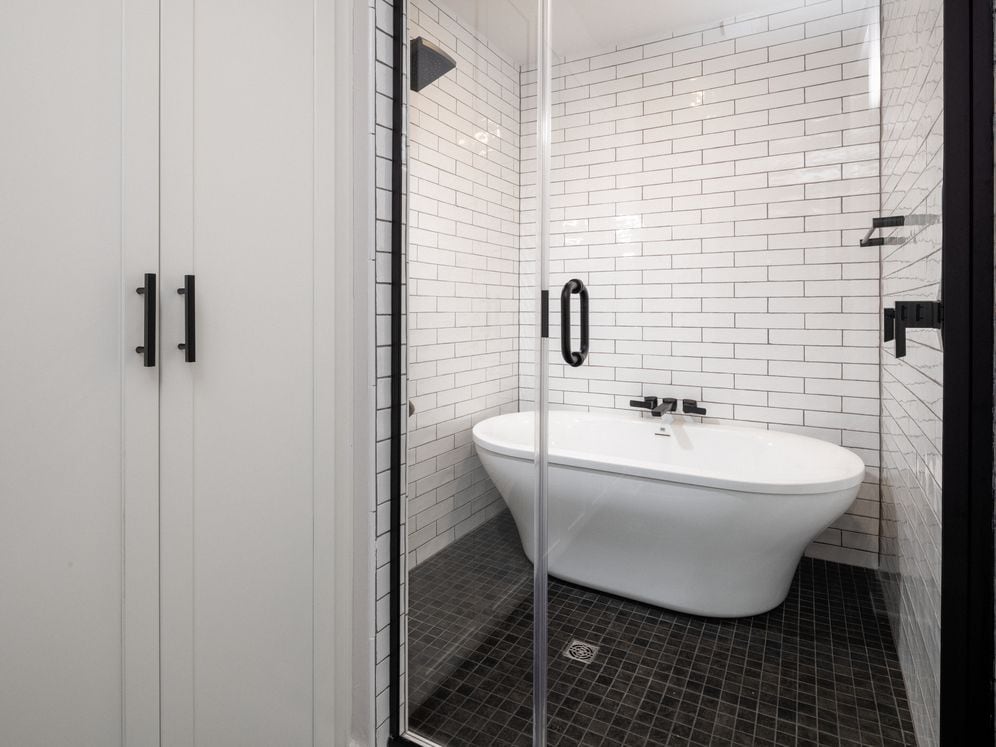 Bath with tub shower