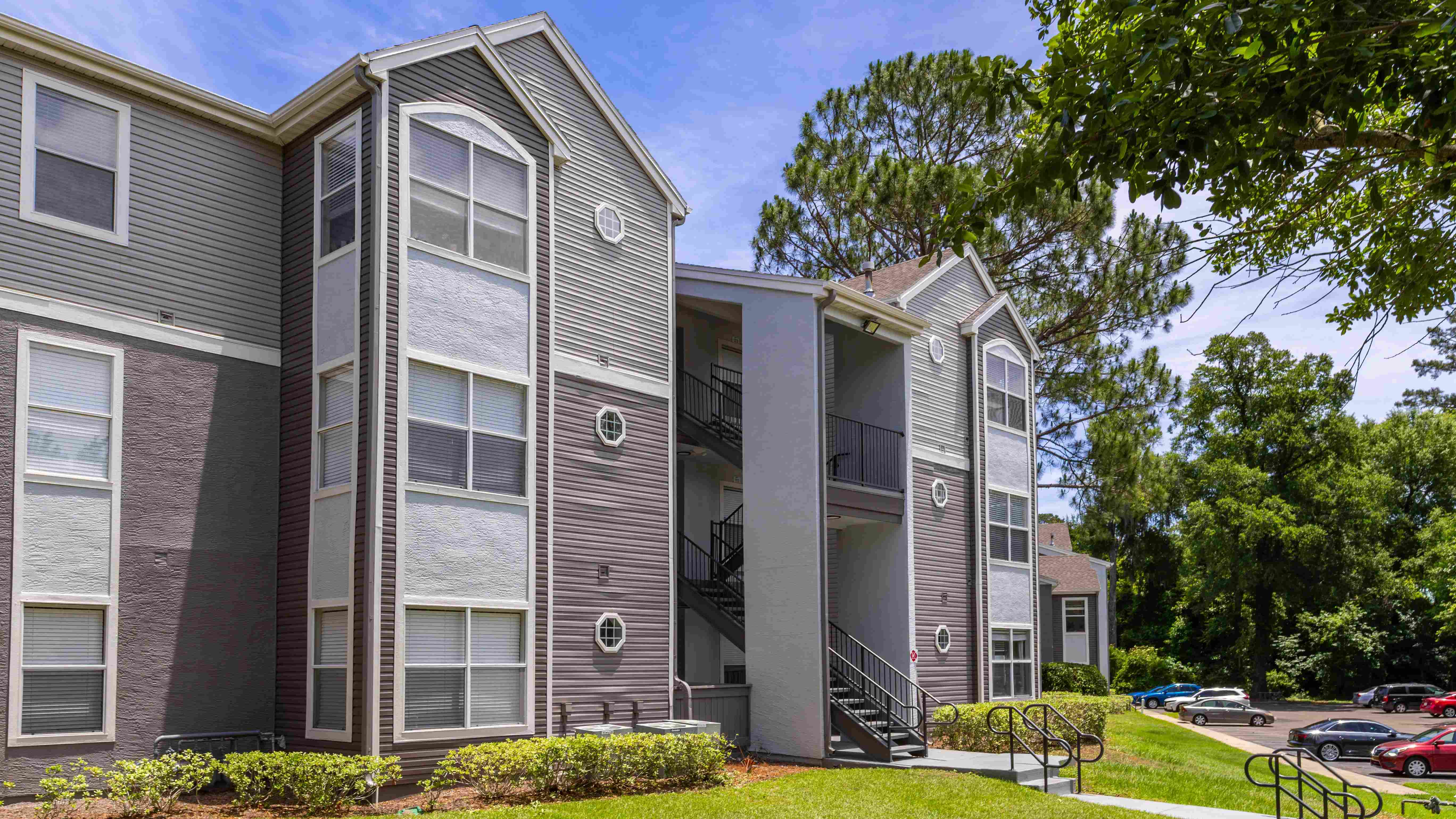 Enjoy the clean and contemporary aesthetic of our revitalized buildings, nestled in a serene, tree-filled setting.