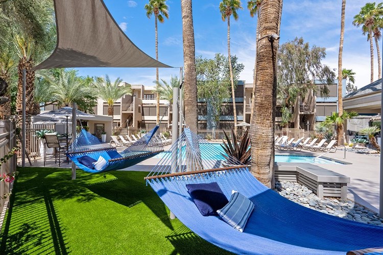 Lay out in our hammock garden located in the pool area.