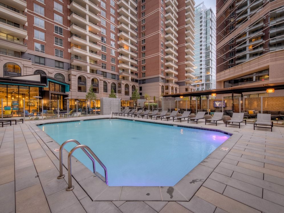Courtyard with swimming pool and sundeck with lounge seating