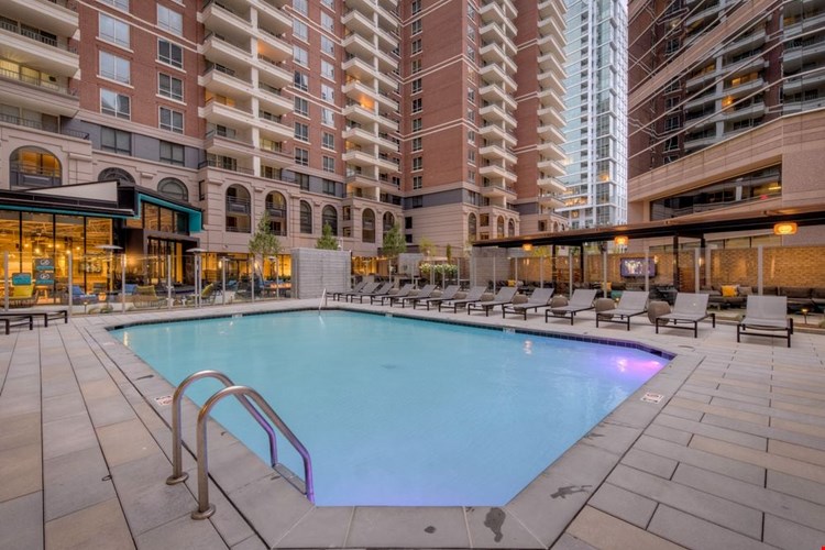 Courtyard with swimming pool and sundeck with lounge seating