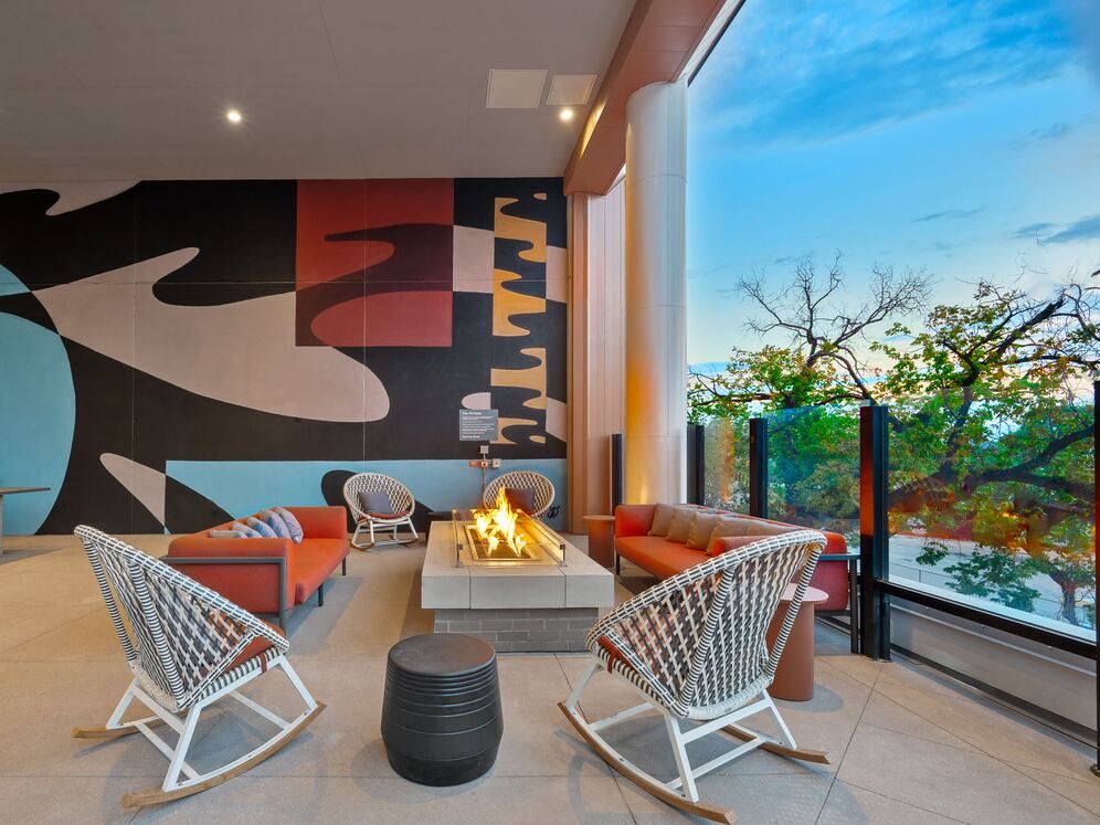 Pool with lounge seating and fire pit