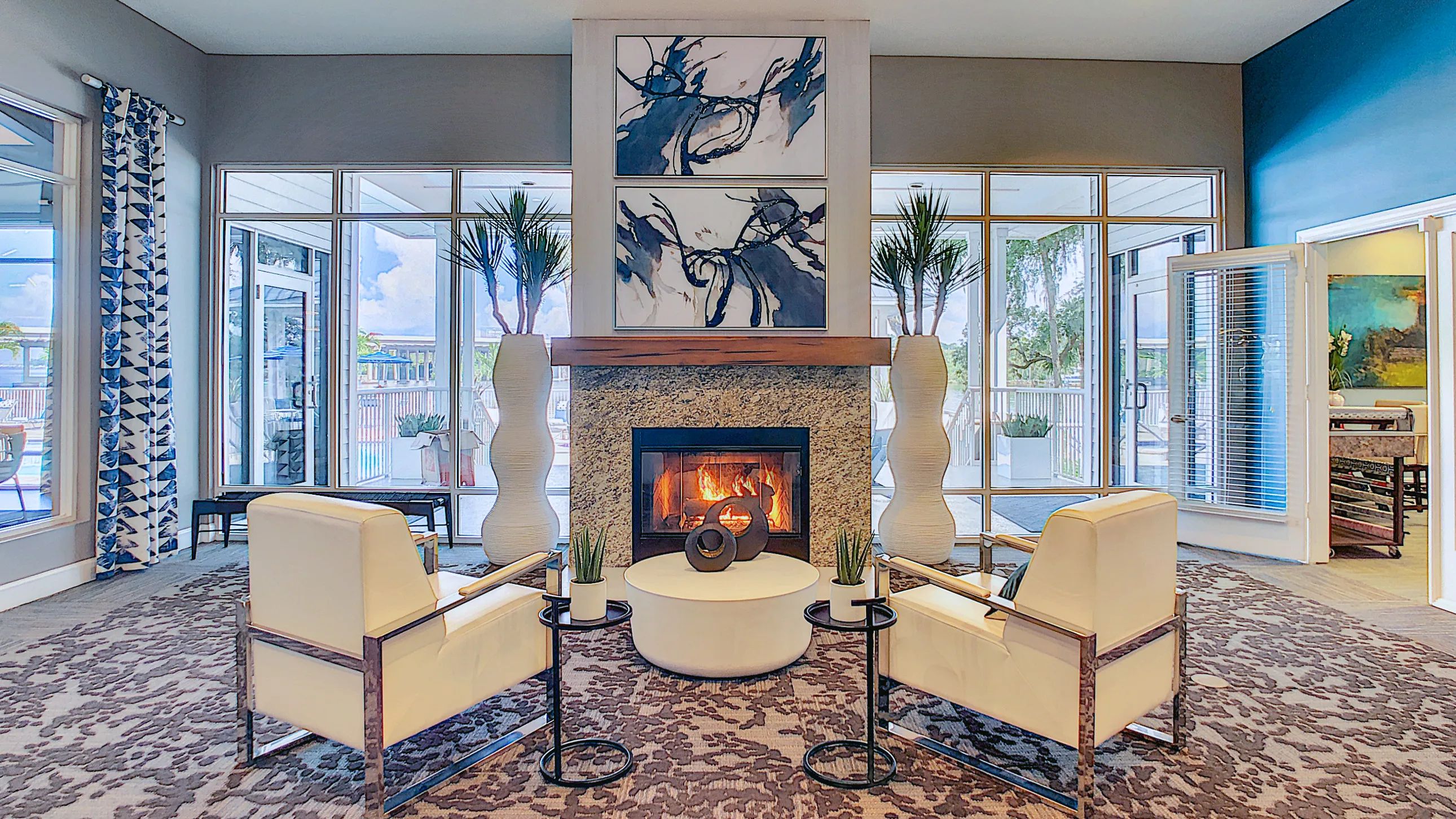 Find solace by the clubhouse fireplace in a serene setting, inviting residents to reflect and unwind in elegance. 