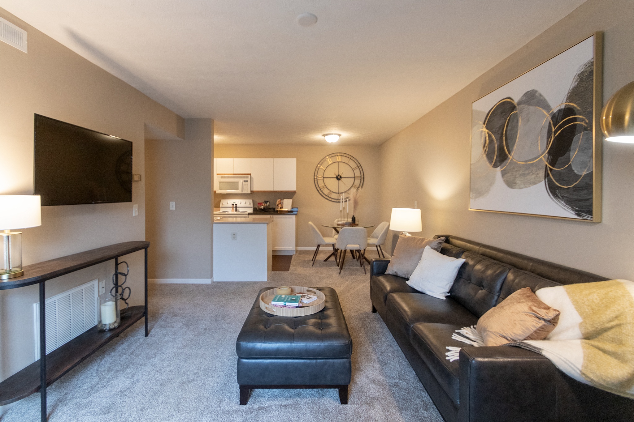 Our model Liberty kitchen features both upgraded cabinetry with dark countertops and classic cabinetry with light countertops.