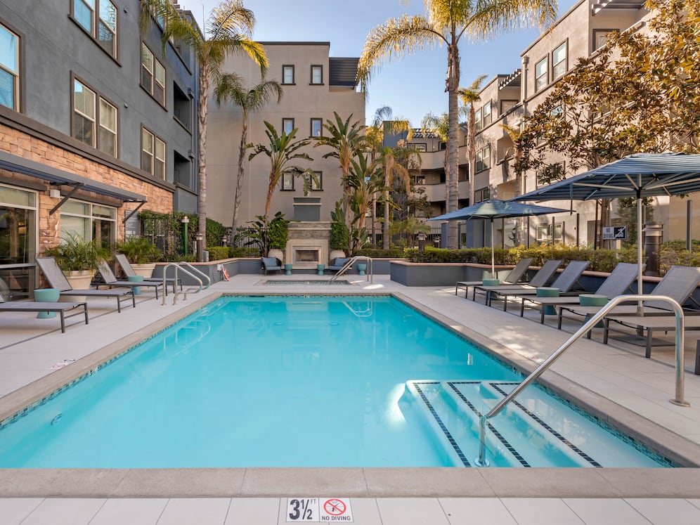 Swimming pool and spa with lounge seating