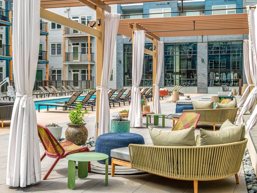 Pool and sundeck with cabanas