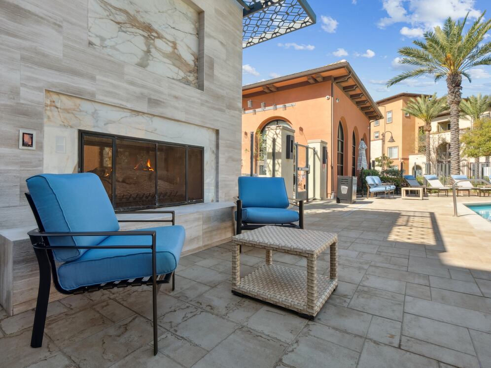 Pool with lounge seating with fire pit