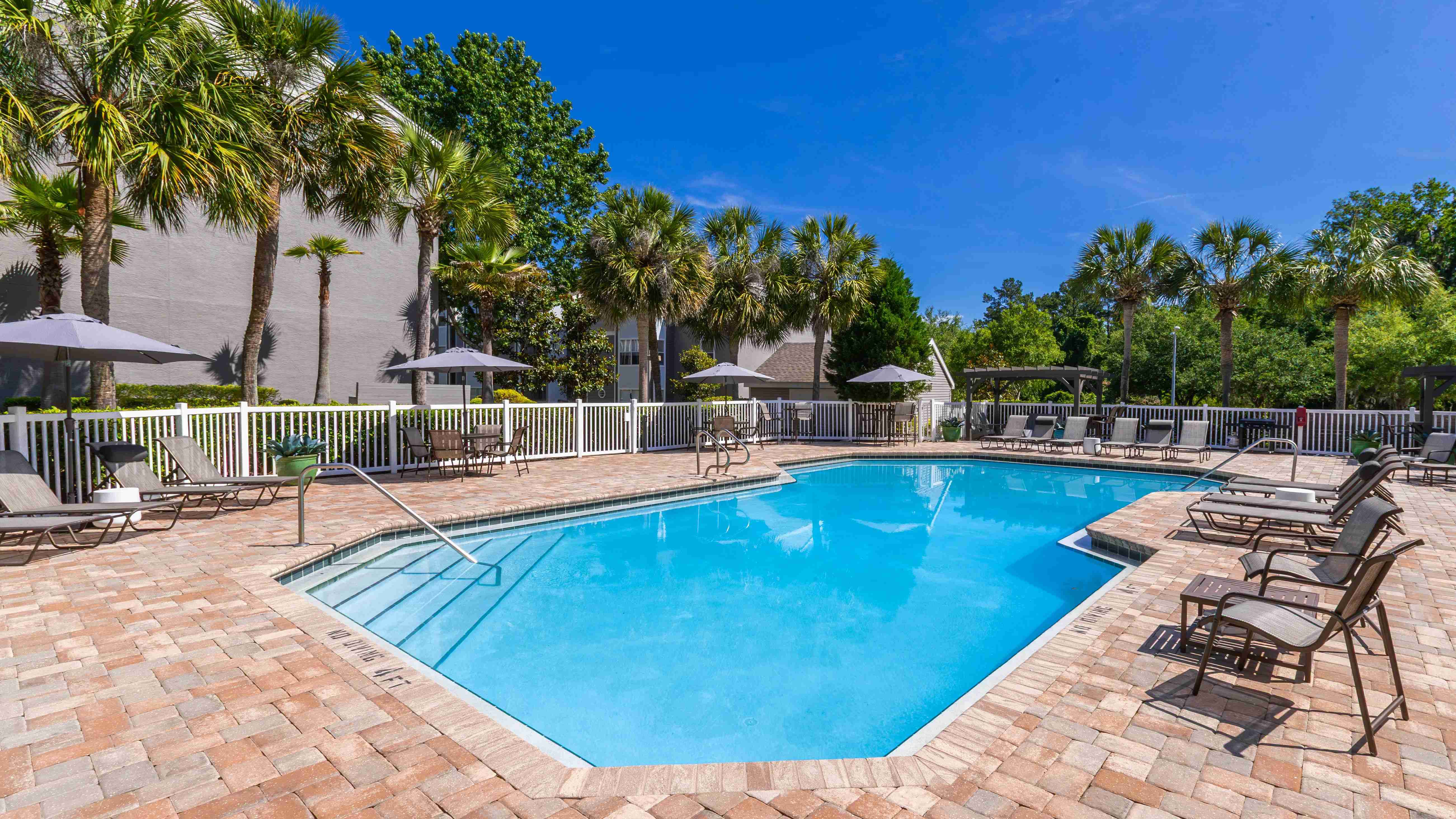 With plenty of seating, shade, and sunshine, our pool deck is the perfect everyday escape.