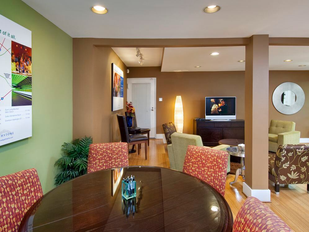 Resident lounge with seating and flat screen television