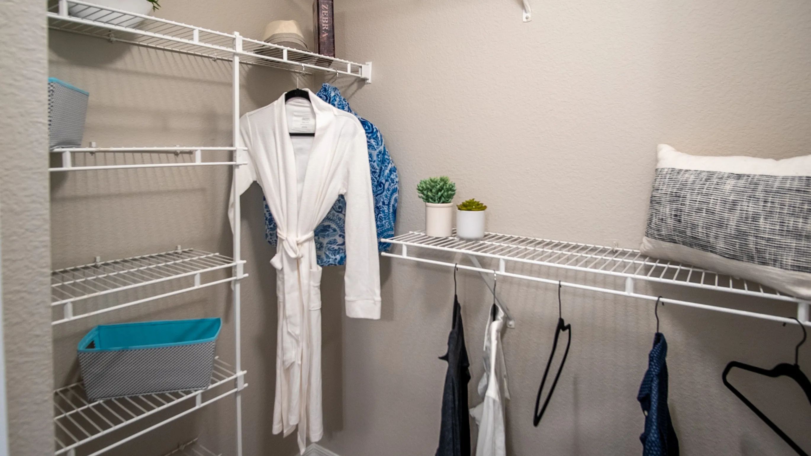 Organize in style with Eagle's Pointe walk-in closets. Abundant built-in open wire organizers ensure your clothing is always ready to impress.