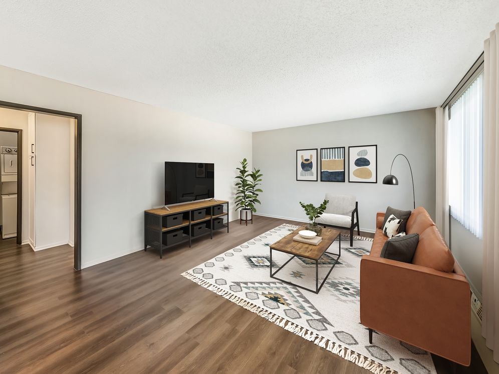 Renovated Package I living room with hard surface flooring (select homes)