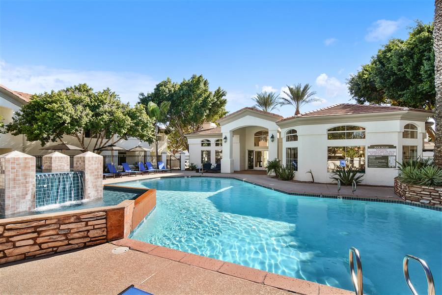 Swimming Pool with Exterior Building in Background