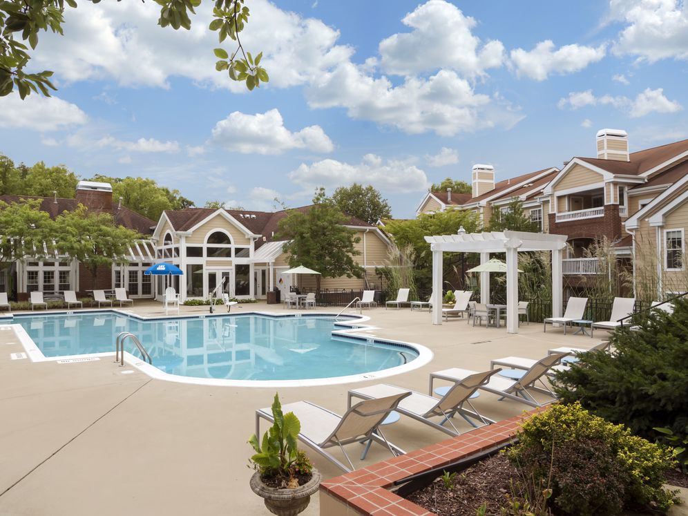 Swimming pool and sundeck with lounge seating