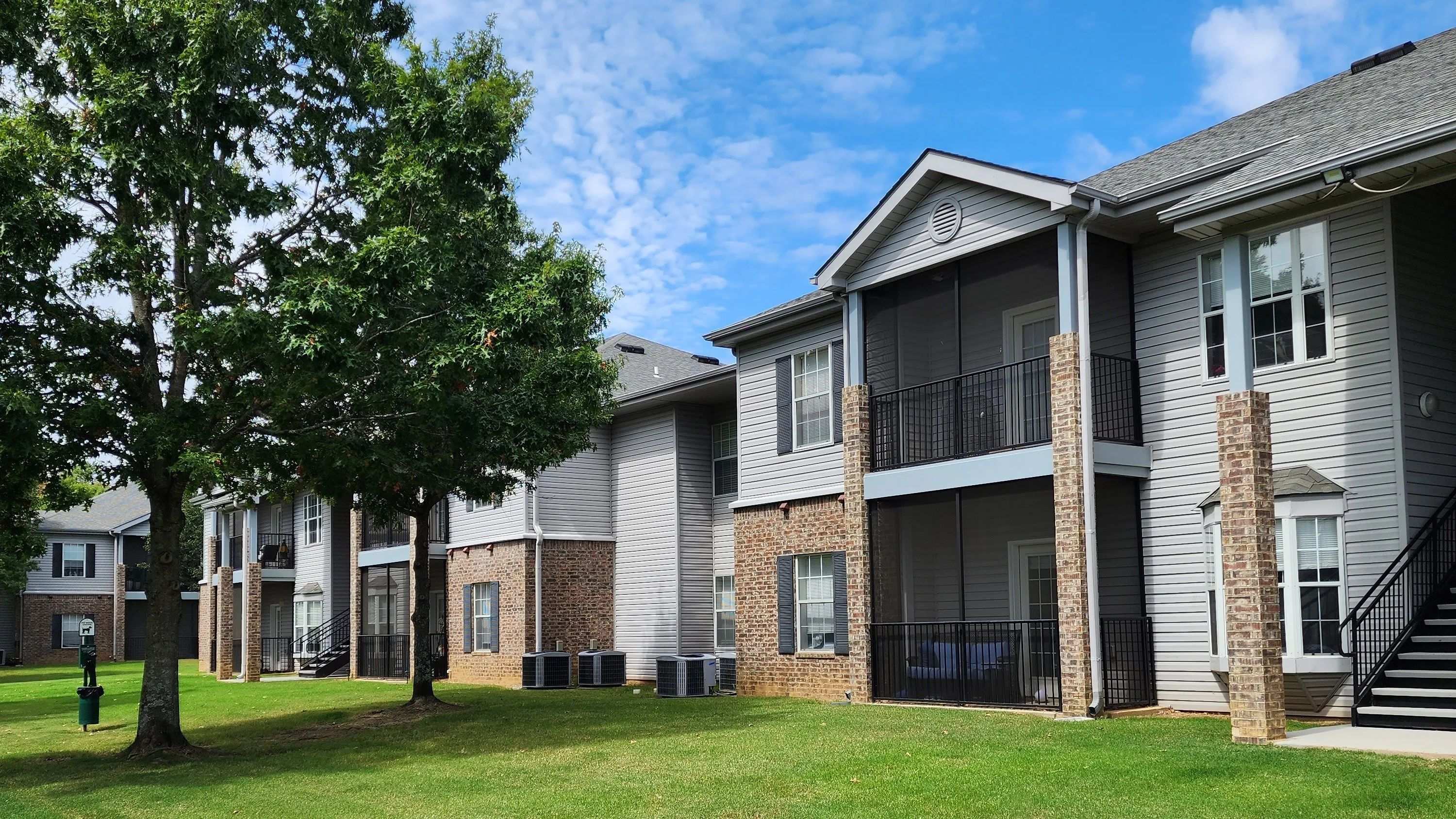 Receive a warm welcome with lush landscaping and freshly painted buildings, setting the stage for an inviting community experience. 