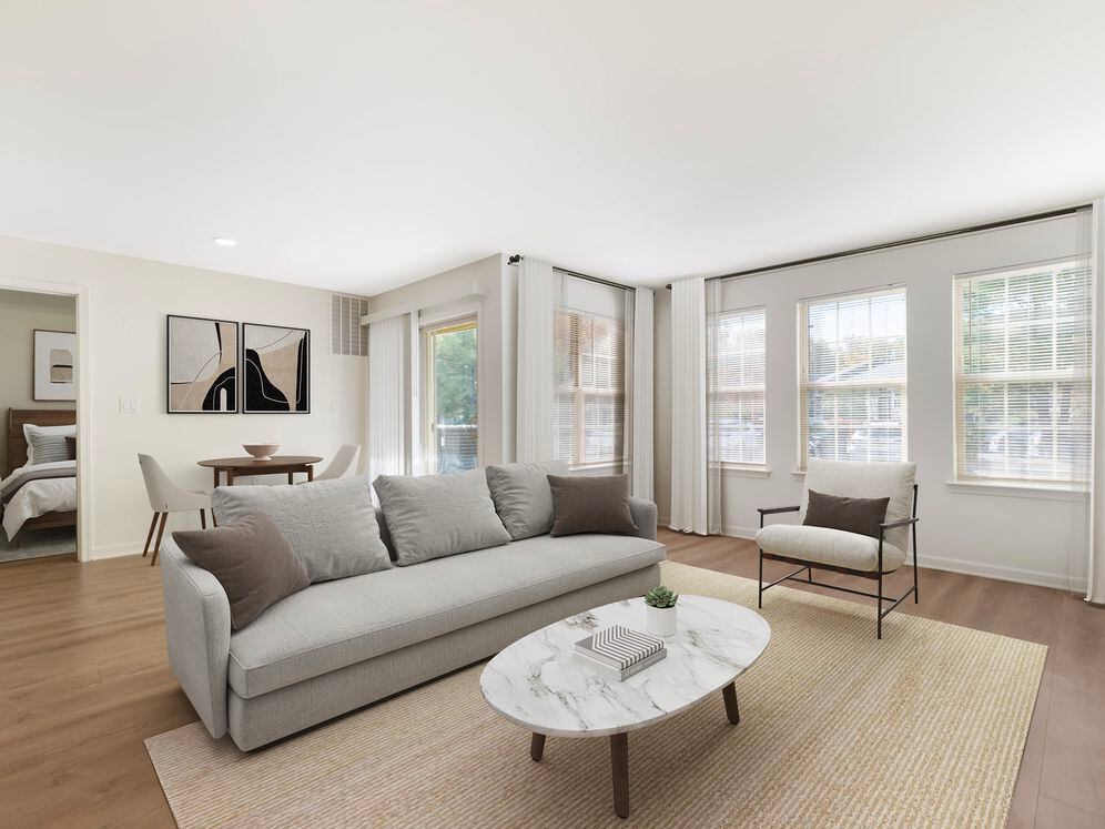 Renovated Package II living and dining room with hard surface flooring