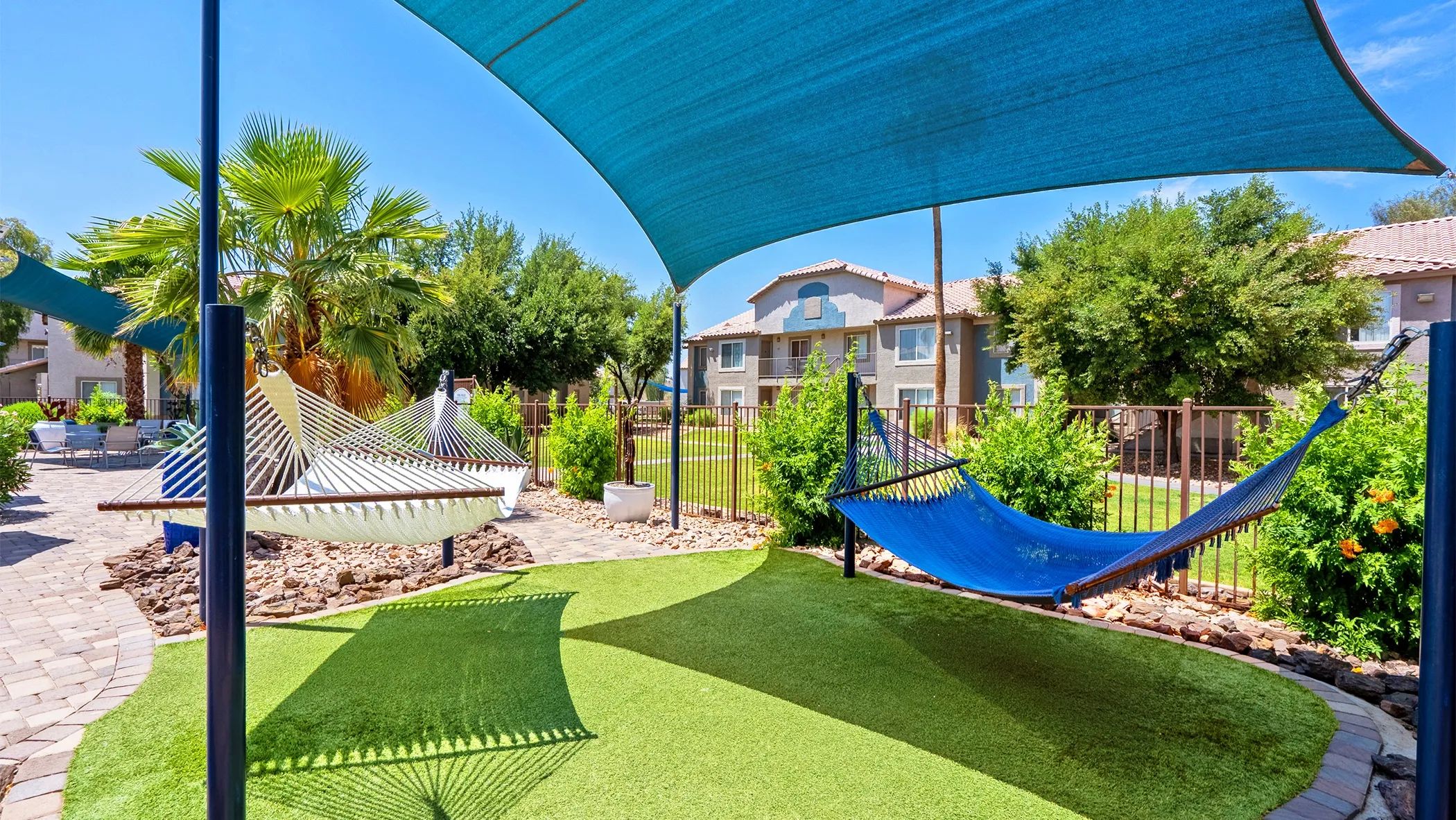 Lounge in style at our poolside hammock garden!