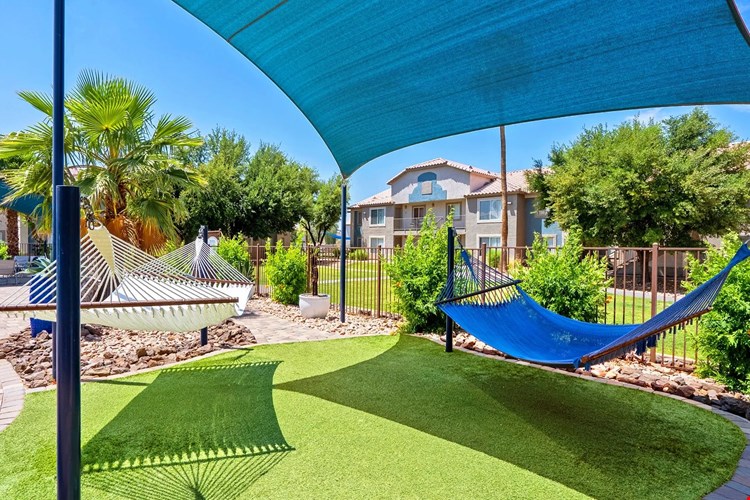 Lounge in style at our poolside hammock garden!