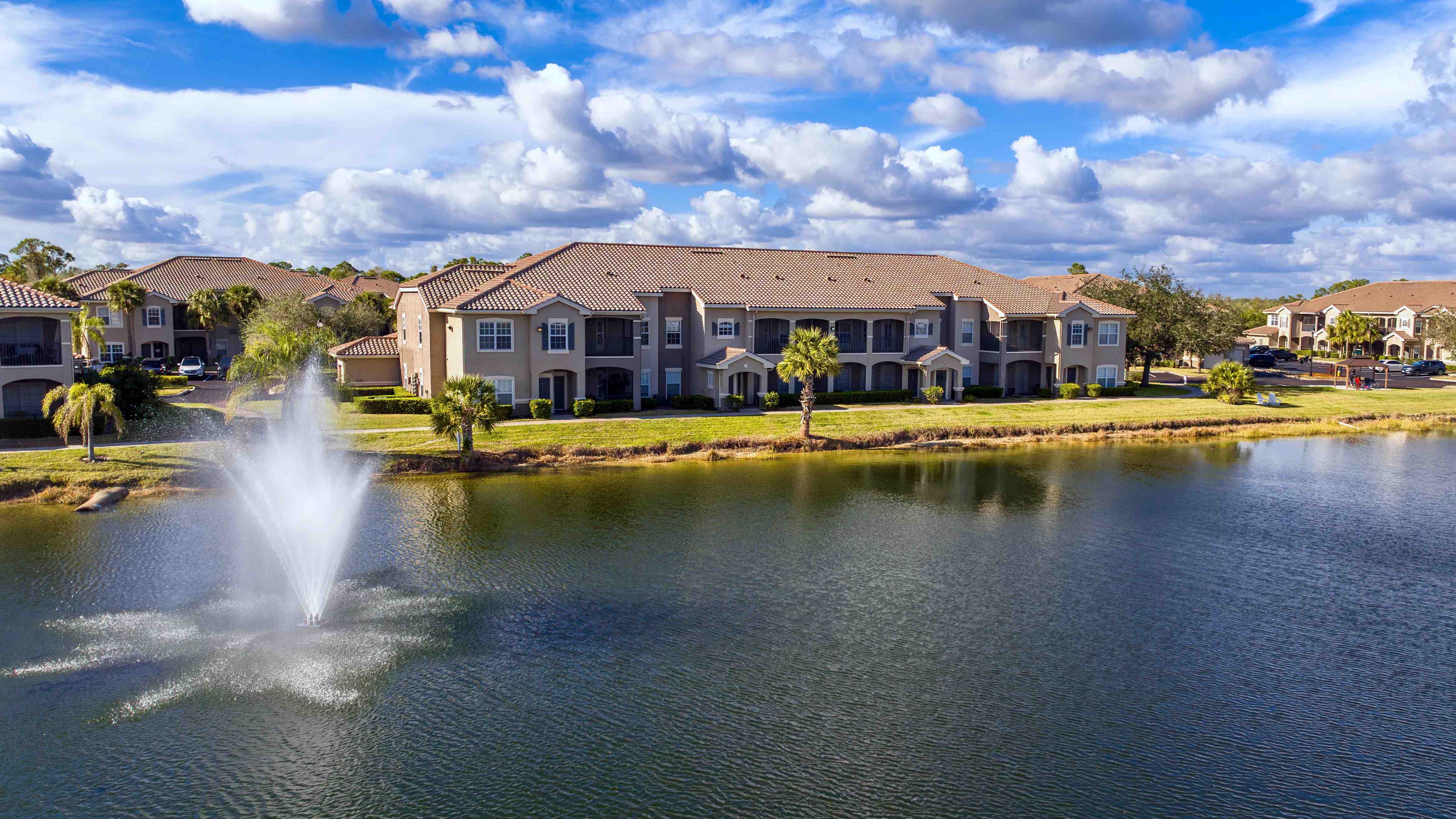 Wake up to the beauty of waterfront living with serene walking paths and a sparkling lake fountain.