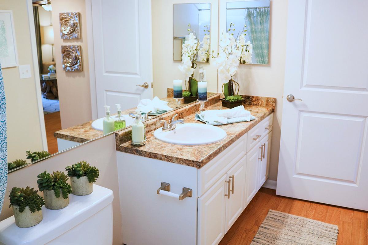 Your spacious guest bathroom offers plenty of storage and privacy for guests.