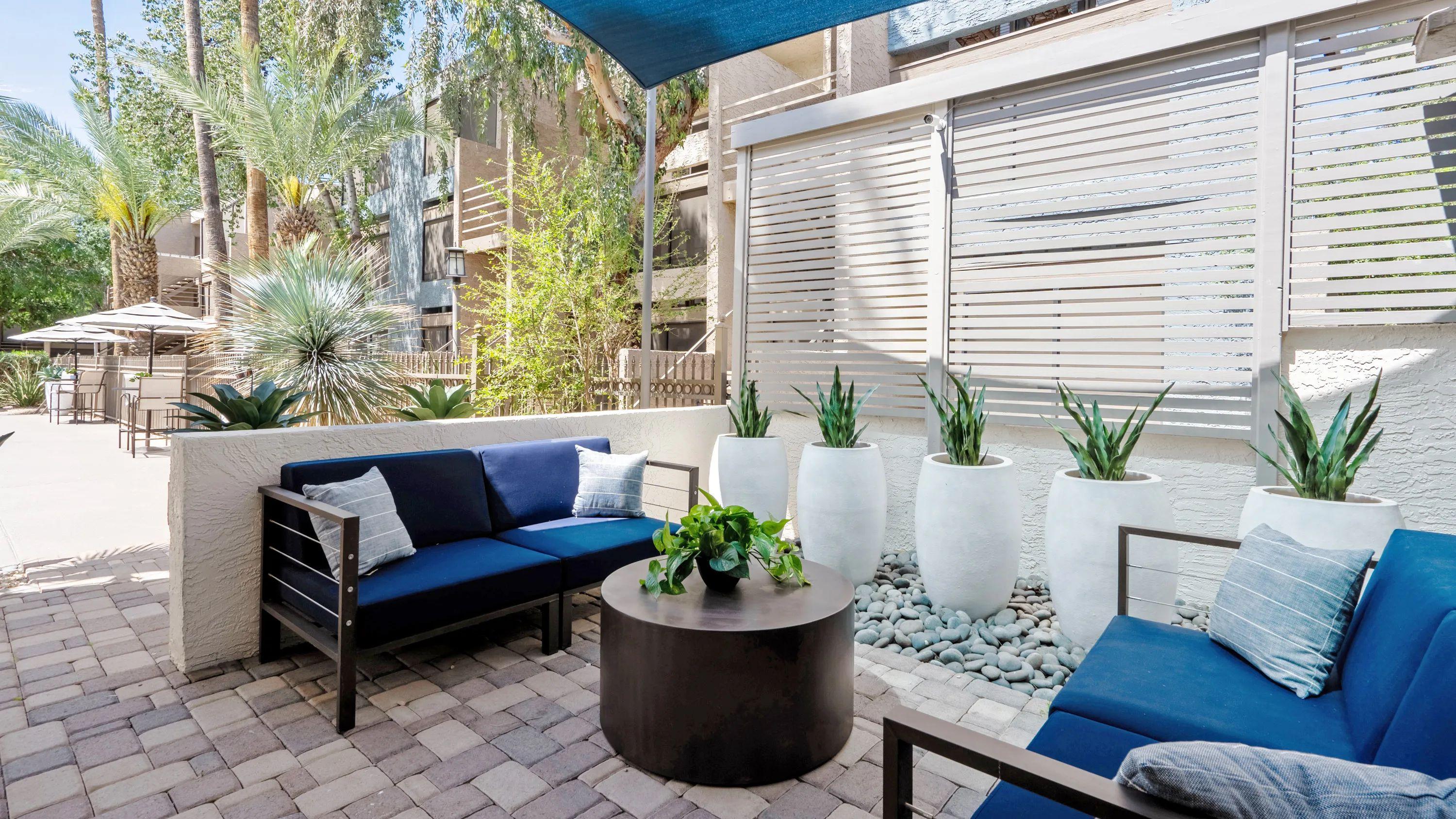 Revel in our poolside escape, offering a cozy shaded corner with plush seating, where relaxation meets vibrant vibes.