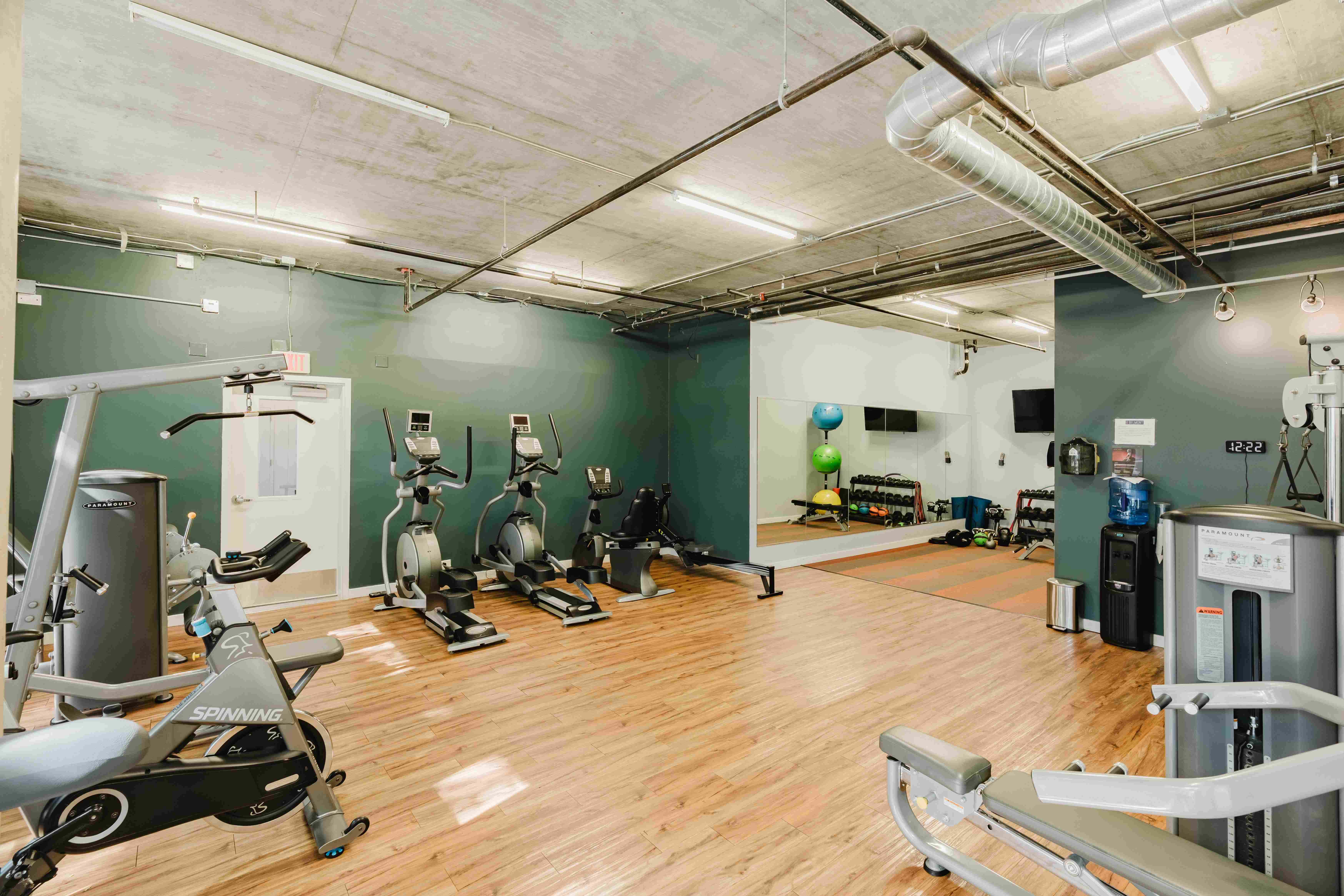 Fitness Center with Free-Weights and Pilates Area