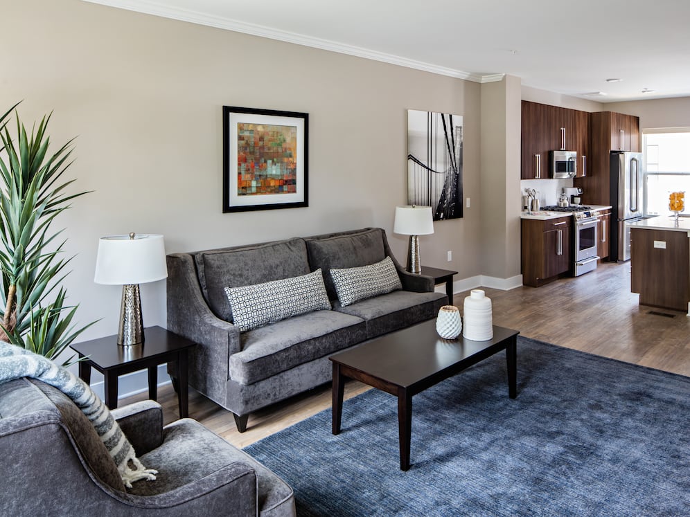 Townhome Signature Collection Living room with hard surface plank flooring throughout