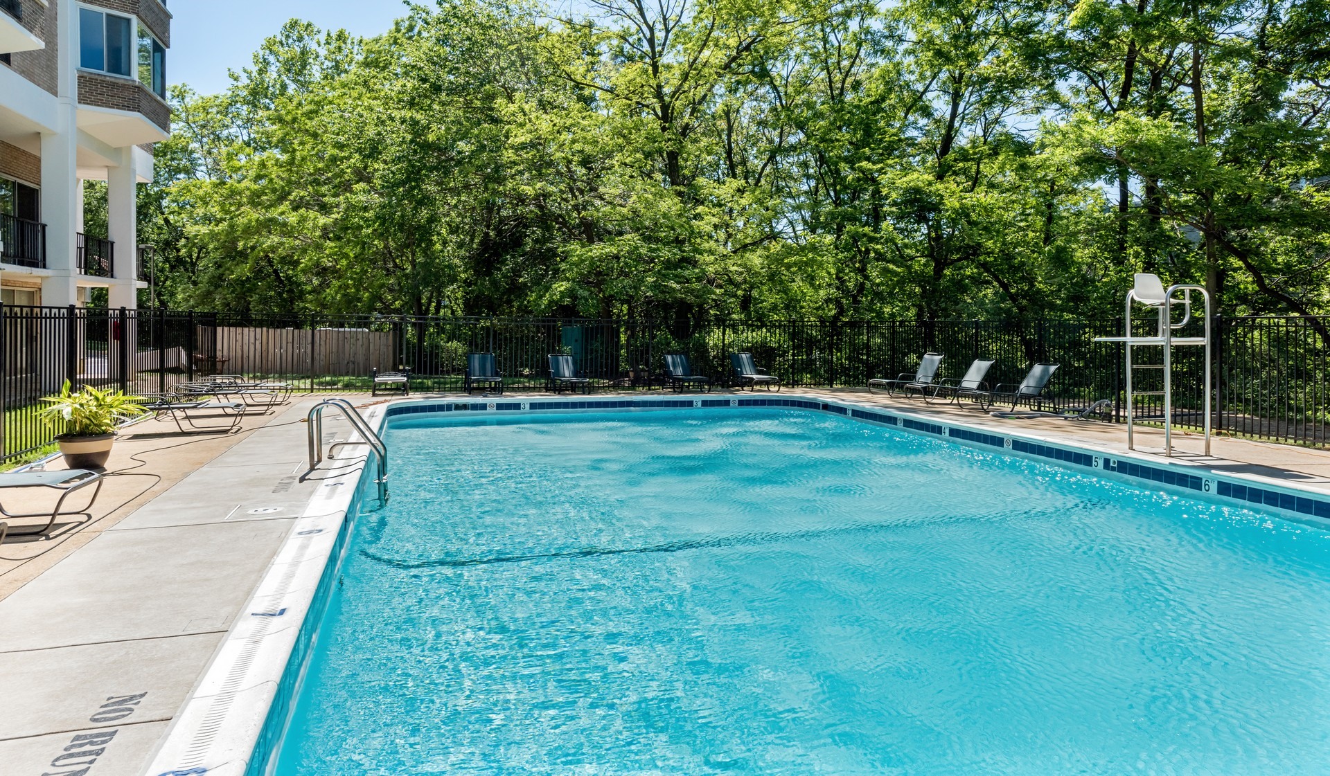 Outdoor pool and furnished sundeck