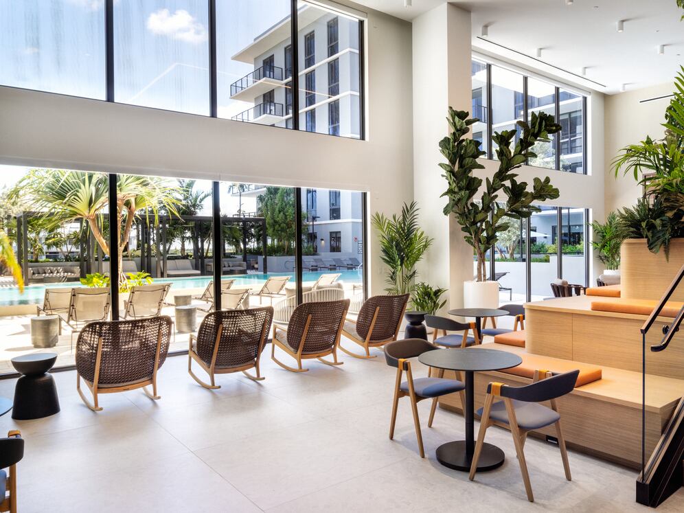 Lower-level resident lounge with multiple seating areas