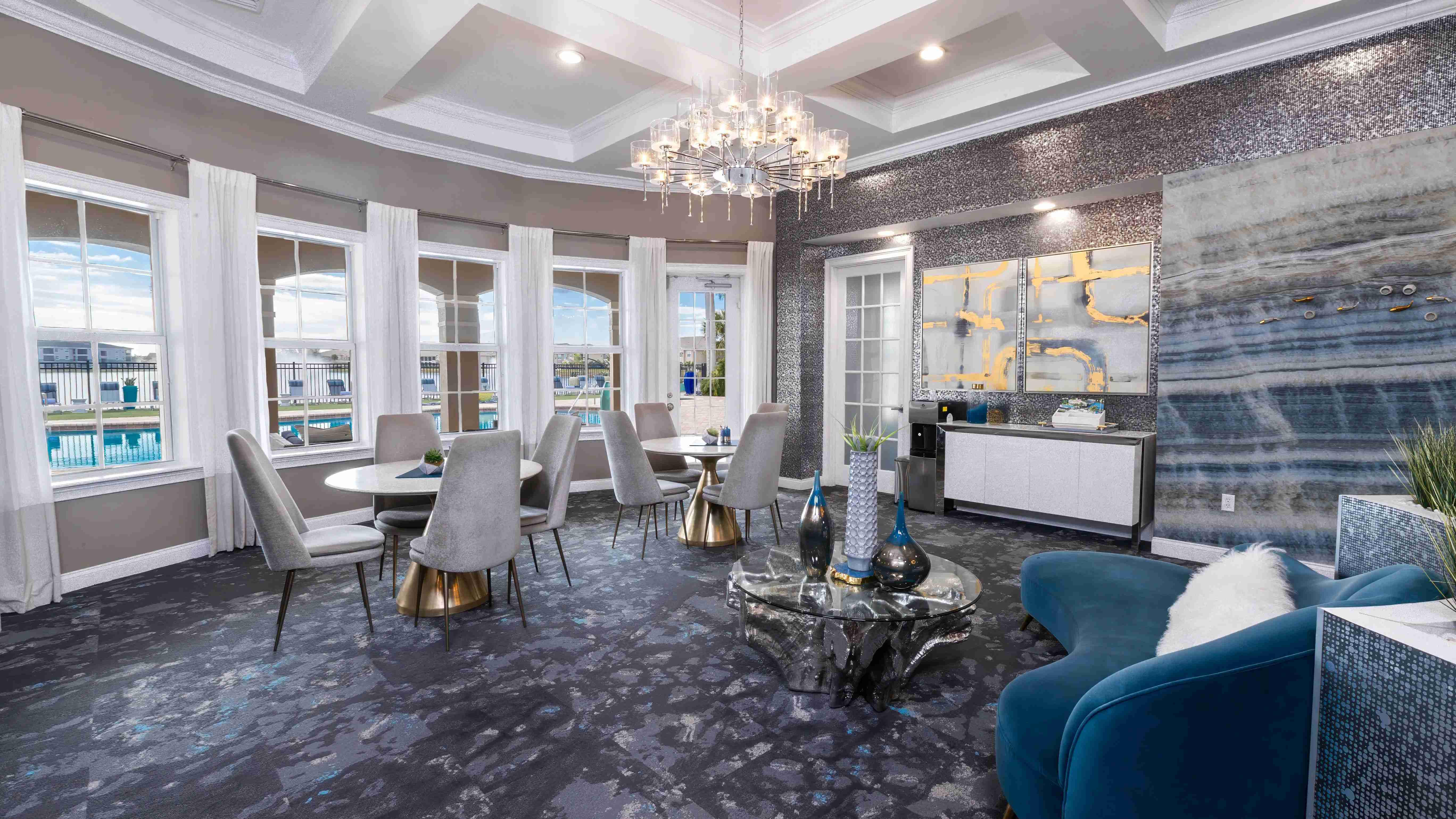 Step into our leasing office, relax in the cozy lounge area, and take in the stunning pool and lake views.