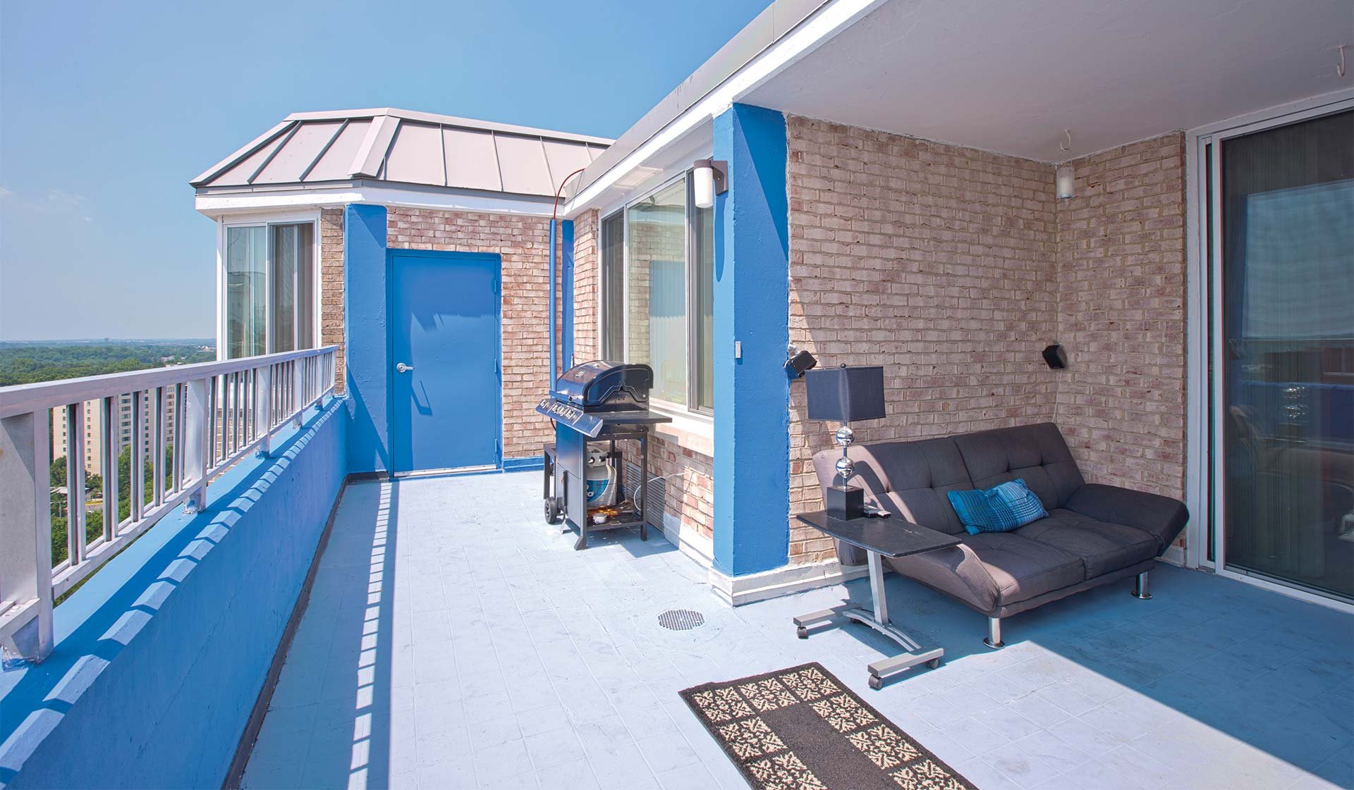 Penthouse patio space with fireplace