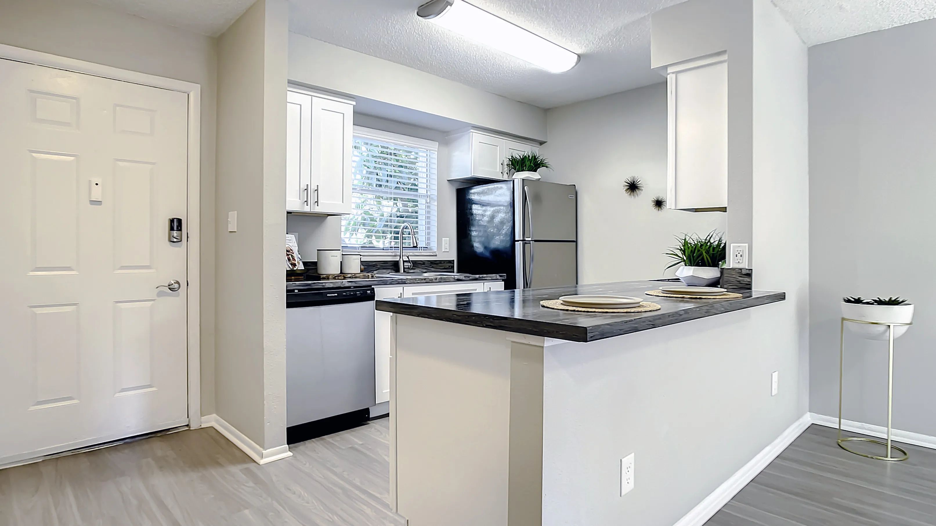 Select floor plans feature kitchens with spacious, open breakfast bars - a host's dream for gatherings and good times.
