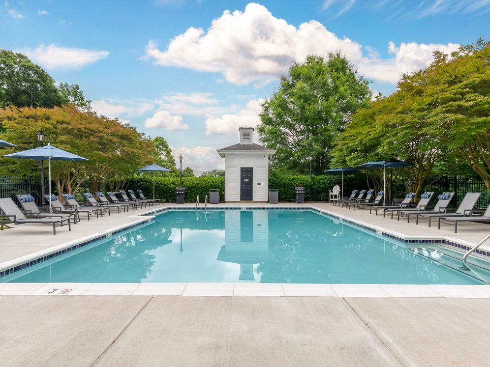 Swimming pool and sundeck with lounge seating