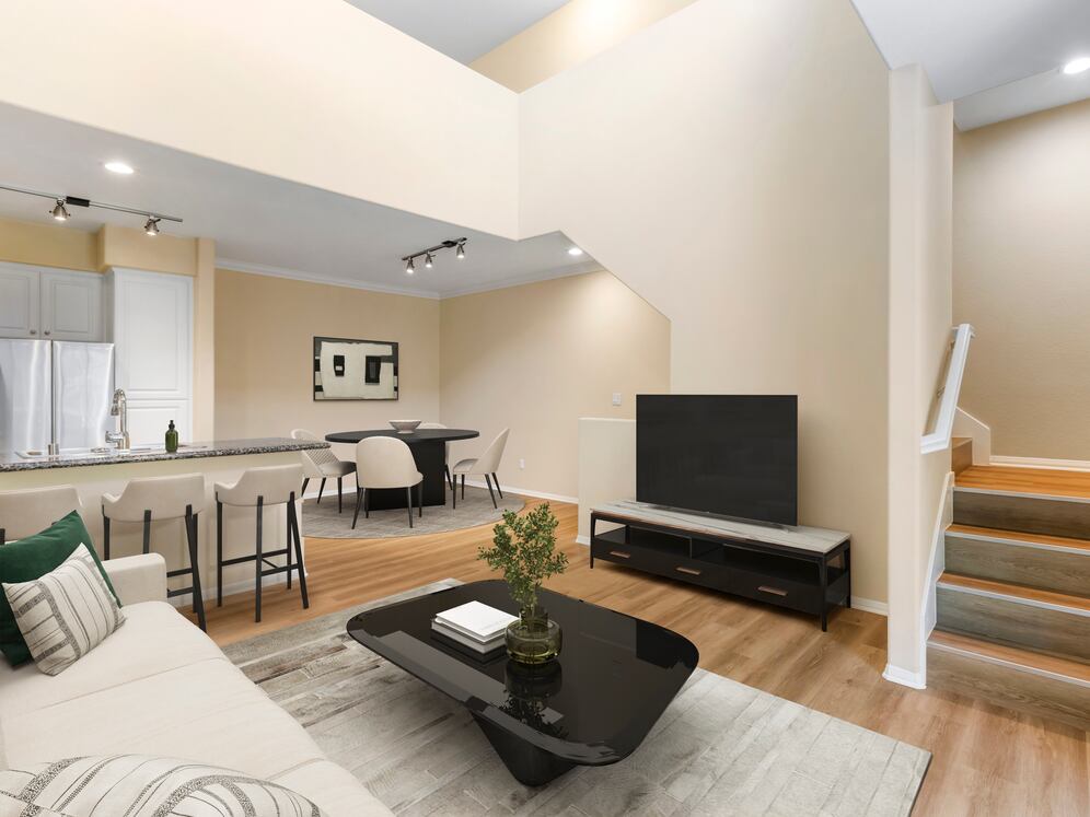 Renovated Package I living and dining room with hard surface flooring