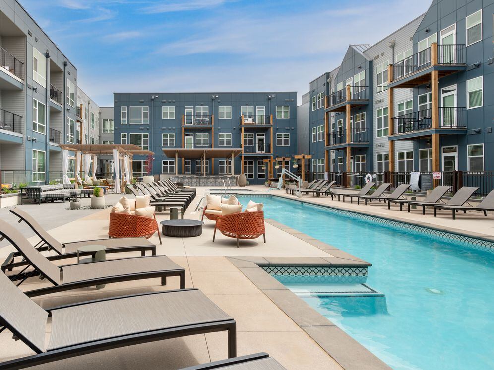 Pool and sundeck with lounge seating